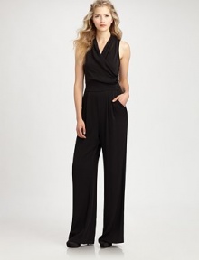 A draped neckline and flattering sash give this silk jumpsuit with a hint of stretch, a beyond-feminine look.Draped v-neckSleevelessPleat details at waistSelf-tie beltConcealed back zipperFully linedAbout 59 from shoulder to hemSilk/spandexDry cleanImported Model shown is 5'10 (177cm) wearing US size 4. OUR FIT MODEL RECOMMENDS ordering true size. 