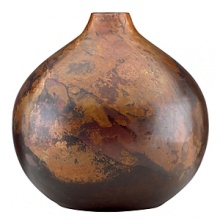 Burnished copper adds a warm finish, perfect for a contemporary décor. From Donna Karan Lenox.