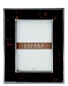 The alluring beauty of multi-faceted Tortoise shell finish presents a warm accent to clean stainless steel in this refined picture frame from Lauren by Ralph Lauren.