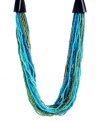 Beautiful beadwork. Kenneth Cole's trendy torsade necklace combines a colorful mix of blue and green seed beads with bugle bead strand accents and a silver tone mixed metal setting. Approximate length: 19 inches + 3-inch extender. Approximate drop: 1 inch.