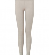 Sumptuously soft and effortlessly cool, Donna Karans pure, beige cashmere blend knit leggings epitomize understated luxury - Crafted with a touch of flattering stretch material - Curve-hugging, medium-rise pull on style with elasticated waist - All-over fine ribbing and cuffed ankles - A must for chic off duty looks - Pair with oversize pullovers, long white button downs and tunic tops