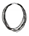 Traditional pearls encounter edgy elegance. This city chic necklace by Majorica features organic, man-made pearls (8-10 mm) strung on multiple black leather cords. Clasp crafted in sterling silver. Approximate length: 16 inches.