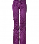 Stay stylish from the lodge to the slopes in these ultra-luxe shimmering ski pants from Jet Set - Zip fly, zippered back pockets, adjustable belt at front with elasticized waistline in back, zippered ankles, layered lining from knee to ankle with elasticized cuff and silicone band for hold - Slim, flared silhouette - Style with a figure-hugging cashmere pullover, shearling boots, and a sleek parka