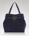 A poised and practical tote in buttery soft suede - every uptown girl needs one. Sling this Tory Burch carryall over the shoulder for exemplary citified style.