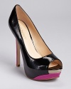 Covetable and color blocked--these glossy platform pumps from Enzo Angiolini showcase the prettiest colors of the season.