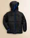 This ultra-soft, ultra-toasty quilted puffer will keep your little man safe from the elements with attached hood and ribbed cuffs and hem.Attached hoodLong sleevesFull-zip frontFront snap beasom pocketsTipped rib-knit cuffs and hemFully linedPolyester failleMachine washImported