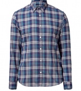 Stylish shirt in fine, pure blue patterned cotton - Soft yet durable, lighter weight material - Elegant check motif in rich shades of indigo and turquoise - Small collar and long cuffed sleeves and full button placket - Rounded hem hangs slightly longer in the back - Straight, classic cut - Versatile and casually cool, easily dressed up or down - Wear solo or beneath a blazer and pair with jeans, chinos or suit trousers