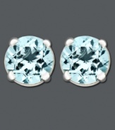 Elevate your look with chic studs in pale blue. Featuring a 14k white gold post setting, earrings feature round-cut aquamarine (3/4 ct. t.w.). Approximate diameter: 1/4 inch.