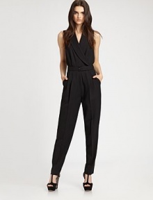 A stunning silhouette rendered in rich wool suiting with standout details like a sheer back panel, front pleats and flattering tapered legs.V-neckWrap frontSleevelessPull-on style with belted waistSide slash pocketsRise, about 9½Inseam, about 30About 64 from shoulder to hemFully linedWoolDry cleanImportedModel shown is 5'10 (177cm) wearing US size 4. 