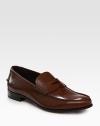 Fine Italian detail and craftsmanship in a timeless loafer design. Leather liningPadded insoleLeather soleMade in Italy