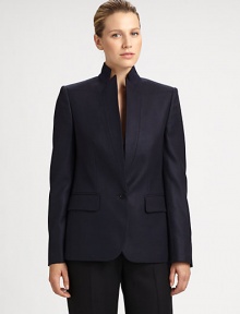 This crisp, sophisticated wool style is finished with a stand collar and unique inverted lapels.Stand collarInverted lapelsButton closureFlap pocketsButton cuffsBack ventAbout 26 from shoulder to hemWoolDry cleanMade in Italy of imported fabricModel shown is 5'11 (180cm) wearing US size 4. Additional Information Women's Premier Designer & Contemporary Size Guide 