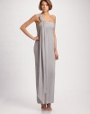 A single ruched chiffon strap wraps around the bodice of this silk style, then flows into a floor-length drape.Asymmetrical neckline Single ruched strap with long drape and jeweled detail Concealed back zip Back center slit Polyester lining 100% polyester Dry clean Imported