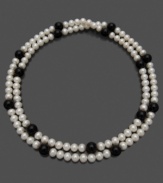 This lovely string of luminous cultured freshwater pearls (7-8 mm) offset by the dark beauty of onyx (7-8 mm) goes with anything, for any occasion. Approximate length: 36 inches.