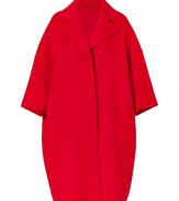 A pristine example of the contemporary Jil Sander look, this radiant fire red wool coat is a statement must-have for modern-minimalist wardrobes - Notched lapel, 3/4 dolman sleeves, dropped shoulders, hidden front snaps, side slit pockets, unlined - Oversized boxy retro silhouette - Team with monochrome separates and jet black accessories