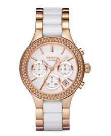 Treat yourself like a queen with the brilliant shine of this rosy watch by DKNY. Polished rose gold ion-plated stainless steel bracelet with center links of white ceramic and round case. Bezel embellished with crystal accents. White chronograph dial features rose gold tone stick indices, date window, three subdials, luminous hands and logo. Quartz movement. Water resistant to 50 meters. Two-year limited warranty.