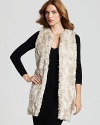 Take luxe to the next level with this French Connection faux fur vest, rendered in a longer, open silhouette. Layer the elegant style it over a body-con maxi dress or a boho blouse and skinnies.