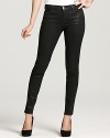 A coated finish lends a leather-like effect to these J Brand skinny jeans, creating a tough-chic look.