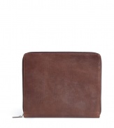 Busy days call for cool carry cases, and Maison Martin Margielas chocolate iPad sleeve is a sleek, streamlined choice - Zip-around closure, zippered slot pocket - A chic way to tote around your most essential accessory