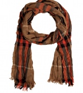 A modern take on the classic tartan scarf, this urbane-cool accessory provides warmth and effortless style - Classic tartan print, easy to style length, frayed edges - Wear with straight leg jeans, a cashmere pullover, and a classic trench