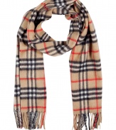 Wrap yourself up in classic style with this luxe cashmere check scarf from Burberry London - Easy to style length, allover classic check print, fringed edges - Style with slim trousers, a cashmere pullover, a sleek trench, and ankle boots