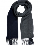 Wrap up in luxe style with this reversible two-tone scarf from Polo Ralph Lauren - Two-tone wool-blend scarf with fringed trim - Pair with a cashmere pullover, straight leg jeans, a parka, and suede ankle boots