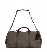 Both rugged and contemporary, Ralph Laurens leather trimmed duffle bag is a classic choice for stashing away your essentials - Dark brown leather trim, double top handles, removable buckled shoulder strap, luggage tag, top zip, inside pocket, durable olive canvas - Pack to the brim for travel, or tote around workout gear for trips to the gym