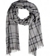 The traditional tartan scarf gets a modern update with this easy-to-style version from New York label Rag & Bone - Plaid pattern, frayed edges - Pair with straight leg jeans or corduroys, a cashmere pullover, and suede ankle boots