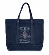 Blue, denim-style canvas tote from iconic American designer Ralph Lauren - Vintage-inspired logo and copper-colored rivits - Large and spacious with two carrying handles, its the perfect companion for shopping, travel or study