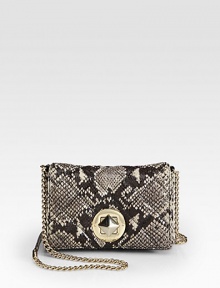 A quilted style in luxurious snake embossed leather with a chic chain strap.Chain shoulder strap, 22 dropTurnlock flap closureOne inside open pocketJacquard lining8W X 5H X 1½DImported