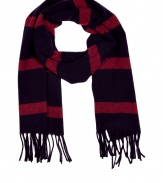 Quietly elegant and effortlessly cool, Jil Sanders dark blue and red wool scarf ups the ante on preppy chic - Supremely soft, lighter weight knit in a rich, classically cool stripe -  Decorative fringe trim at hem - Moderately long and wide and ultra-versatile - Pair with everything from cashmere pullovers and jeans to leather jackets and dress trousers