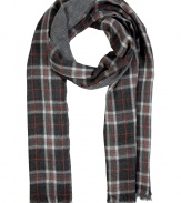 Forever-favorite plaid gets a kick of contemporary cool in Closeds cool orange accented scarf - Fringed edges, solid charcoal heather reverse - Team with modern coats and jet black leather gloves, or wear indoors over soft pullovers and everyday favorite slim legged trousers