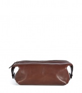 Stash away your travel essentials in Ralph Laurens classic brown leather dopp kit - Embossed logo detailing on front and sides, push-stud detailed side tabs double as carrying handles, top zip, inside zippered back wall pocket - Tuck into chic luggage or duffle bags for trips to the gym