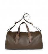 Perfect for getaways or toting around gym essentials, Marc by Marc Jacobs textured leather duffle bag is a stylish way to take on travel - Smooth leather double top handles, removable belted shoulder strap, embossed logo tag, top zip closure, zippered pocket on one end, 2 inside front wall pockets, zippered back wall pocket with additional pocket, credit card slots and pen loop - The perfect size for stashing away weekend essentials