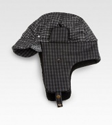 Mixed check trapper hat with soft brim and faux Sherpa lining.One size fits mostAcrylicDry cleanImported