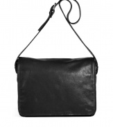 Stash away business essentials in style with Maison Martin Margielas jet black leather messenger bag, complete with practical pockets and characteristic cool detailing - Flap-over front, two-way zippered back pocket, top zip, inside zippered back wall pocket - Make it your everyday favorite accessory for a luxe note of streamlined modernity