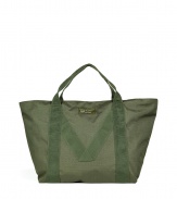 Perfect for travel, running errands or toting around gym essentials, Marc by Marc Jacobs carryall tote is as stylish as it is versatile - Double top handles with M patterning on front and back, top zip closure, front logo patch, inside zippered back wall pocket - Wear with sporty outerwear, casual separates and fashion sneakers