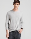 Powerfully soft cashmere maximizes comfort and demonstrates your keen sartorial sensibility with this handsome V-neck sweater from John Varvatos.