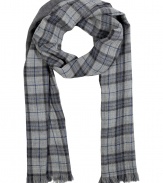 Forever-favorite plaid gets a kick of contemporary cool in Closeds cool blue accented scarf - Fringed edges, solid charcoal heather reverse - Team with modern coats and sleek leather gloves, or wear indoors over soft pullovers and everyday favorite slim legged trousers