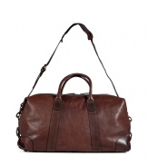 Both classic and contemporary, Ralph Laurens leather duffle bag is a timeless choice for stashing away your essentials - Double top handles, removable buckled shoulder strap, buckled sides, top zip, inside zippered pocket - Pack to the brim for travel, or tote around workout gear for trips to the gym