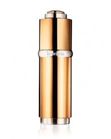 Luxurious. Opulent. Precious. Truly the gold standard of de-aging, this newly enhanced skin-enriching super serum, with a fresh new scent, gives your face a 24-karat glow. Newly developed peptides join Pure Gold, suspended in a colloidal gel, to help prevent the breakdown of collagen and elastin and improve elasticity and firmness. With one single drop, it diminishes lines and wrinkles and helps regulate pigmentation, while re-vitalizing and illuminating the skin with a stunning radiance.The Benefits:Illuminates and brightens skin immediately while reducing age spots Rapidly plumps lines and wrinkles to give your skin a satiny smoothness Speeds exfoliation to reveal fresh, younger looking skin Increases firmness and elasticity, improves your skin's vitalityThe Application:Day and night, dispense one drop onto the palm of your hand and gently smooth over your face, neck and décolleté. Your skin will take on a golden radiance. Follow with your daily moisturizer.