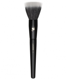 This unique brush features synthetic and natural bristles for versatile effects. Provides the lightest application of highlighters, blush and face powders for a flawless, professional look. Denser brush hairs absorb more product for applying color, or buffing off excess pigments. How to use: For color or highlighter application dip bristled head into powder and tap off excess. Use as a traditional powder or blush brush, either in sweeping strokes towards the temples, or in a circular motion on the apples of cheeks. For softening or buffing effect first ensure brush is free of color. Using bristle tips only blend with gentle, circular strokes.