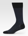 An elegant business look with the comfort and durability of fine merino wool. Ribbed toplineMid-calf height80% merino wool/20% polyamideMachine washMade in Germany