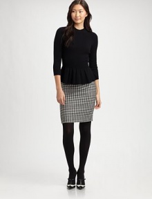 Leave it to houndstooth to add timeless charm to the classic pencil skirt.Solid waistbandWaist dartsBack zipperAbout 21 long52% rayon/48% woolDry cleanImported Model shown is 5'11 (180cm) wearing US size 4. 