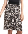 Alfani's latest skirt has plenty of personality with a bold animal print and tiered silhouette.