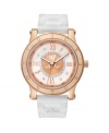 Perfectly suited for Her Royal Highness. HRH watch by Juicy Couture crafted of white silicone bracelet and round rose gold-plated stainless steel case with logo-etched bezel. White dial with inner textured rose gold tone dial crystallized with Swarovski elements features rose gold tone Roman numerals, minute track, luminous hands and iconic crown logo. Quartz movement. Water resistant to 30 meters. Two-year limited warranty.