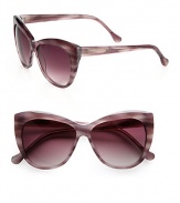 Crafted in hand-made acetate, this retro, exaggerated cat's-eye design is ultra-cool. Available in shiny purple with brown gradient lens or black with black gradient lens.Acetate temples100% UV protectionImported