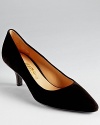 Low but well-heeled, these Salvatore Ferragamo kitten heels pumps showcase classic glamour.