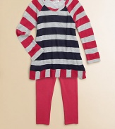 Two tones of wide rugby stripes on a cozy waffle knit with subtle sparkle join solid jersey leggings in this delightful duo. TopScoop necklineLong raglan sleevesVertical striped hem Pants Elastic waistbandSmooth jerseySlim legging fitTop: rayon/modal/cotton/LurexPants: cotton/modal/spandexMachine washImportedAdditional InformationKid's Apparel Size Guide 