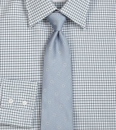 A sartorial standard in a beautifully crafted woven neat silk pattern.SilkDry cleanMade in Italy