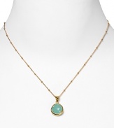 This haute bohemian pendant necklace from Coralia Leets charms with rich texture and hue. The gleaming gold setting sets off a peruvian opal stone.